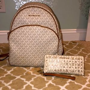 *Micheal Kors* Large backpack purse and wallet.